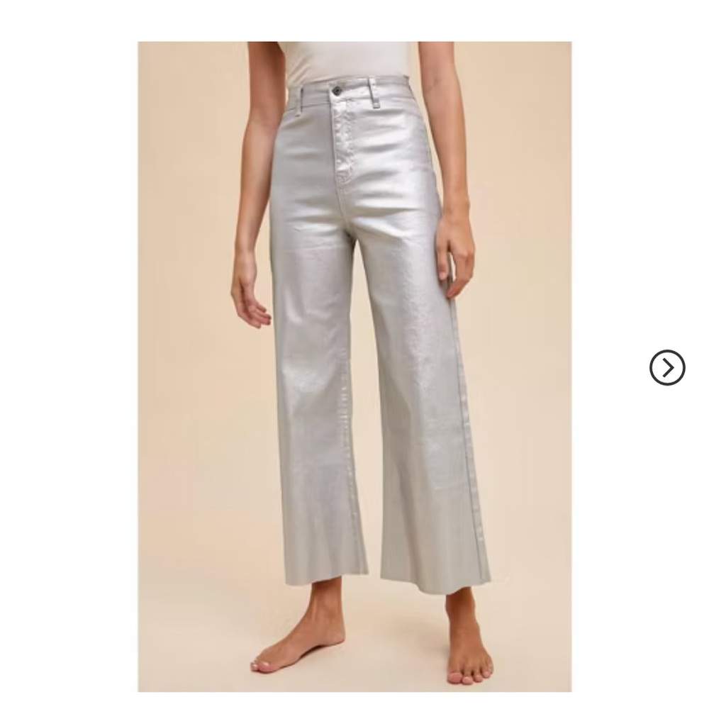 Annie wear high waisted silver pants